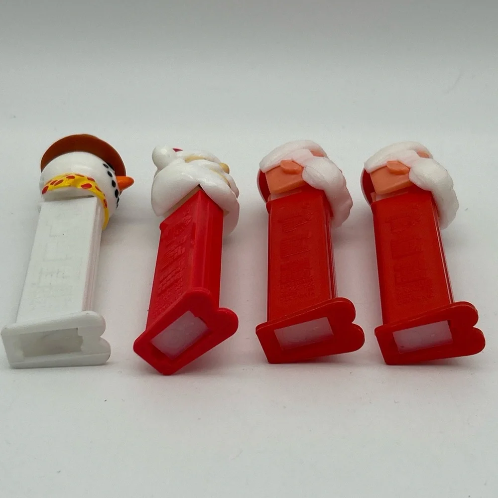 Lot Of 4 Vintage PEZ  Candy Dispensers Santa Clause And Snowman